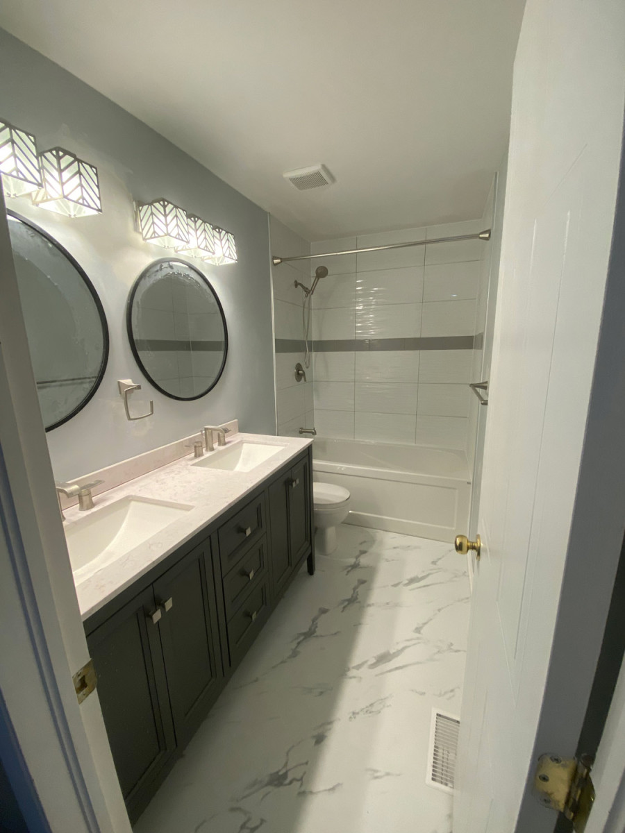 Stylish bathroom featuring a glass shower enclosure
