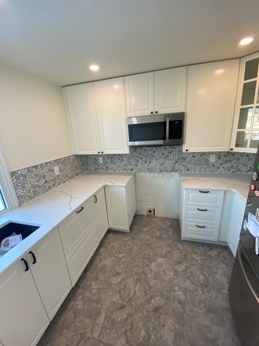 Compact kitchen with efficient storage and a minimalist design
