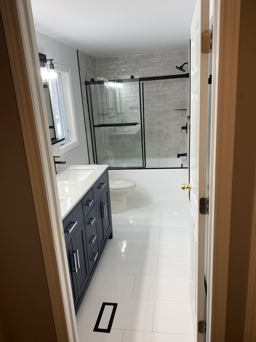 Luxury bathroom featuring a jacuzzi tub and ambient lighting