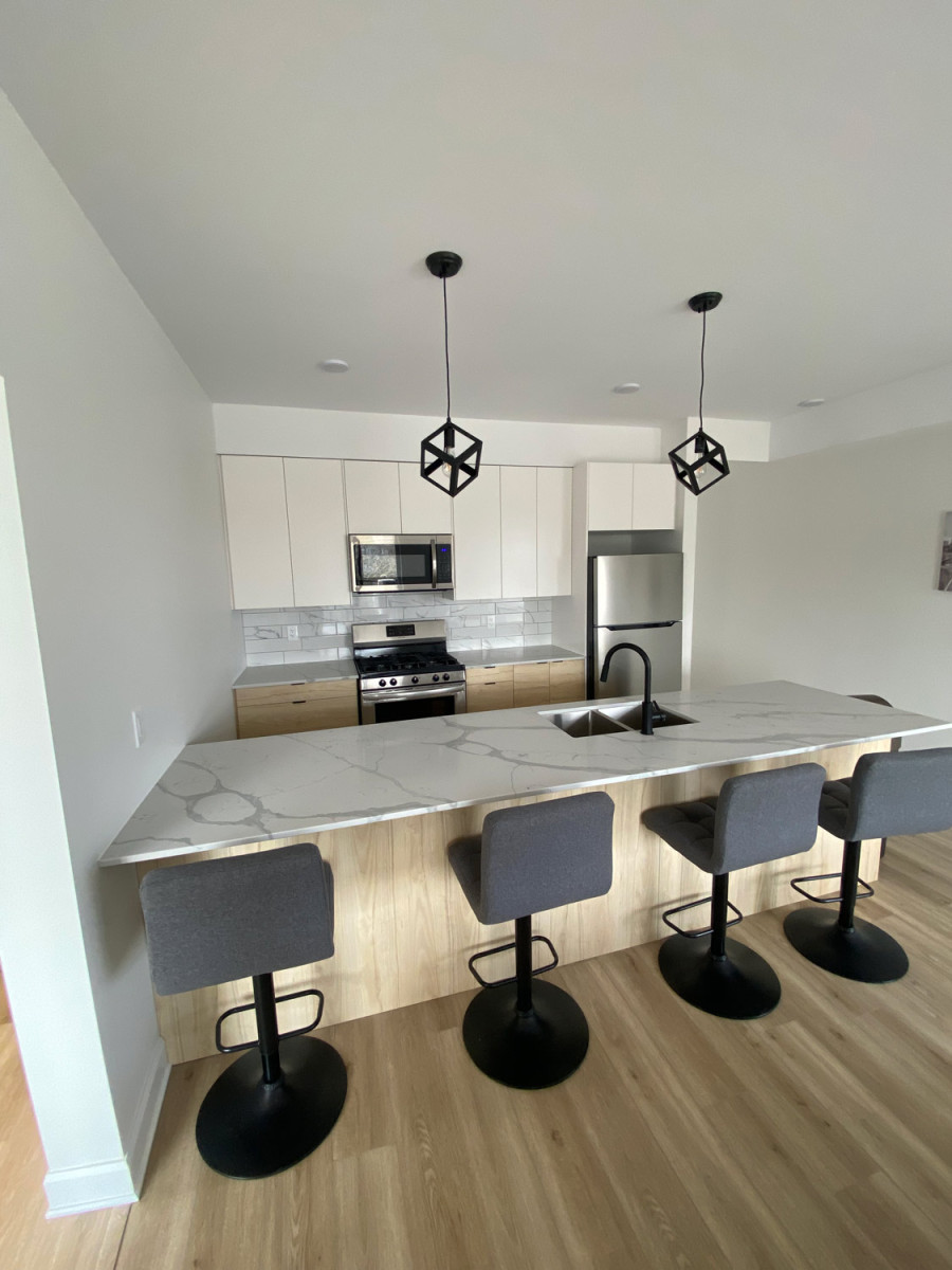 Family-friendly basement diner with colorful wall art and seating