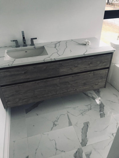 pedestal sink and vintage lighting