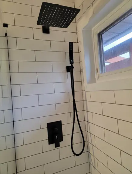 Stylish bathroom featuring a glass shower