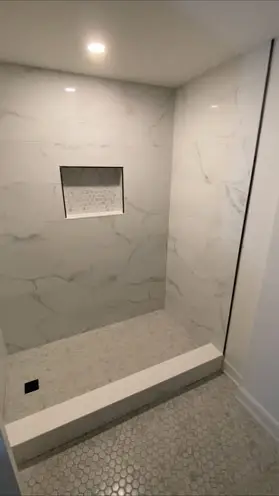 Glossy ceramic tiles in a modern bathroom